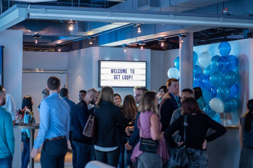 A crowd gathers together at Get Loopi, 2019.