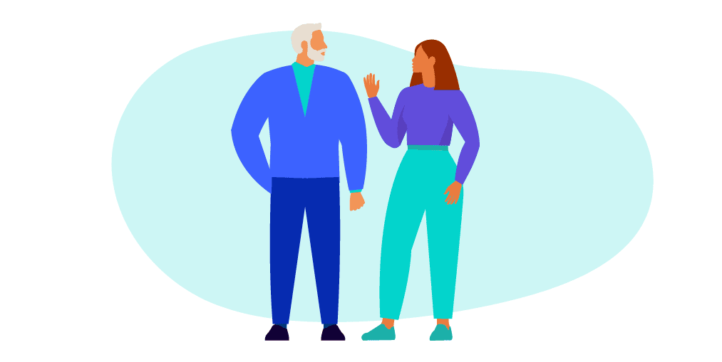 A female and male co-workers are having a conversation.